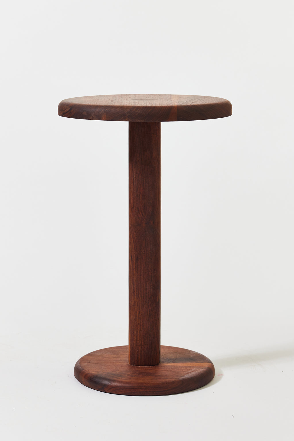 Florian Side Table with large top in solid walnut. Handmade round wooden pedestal side table by Phillip's Daughter