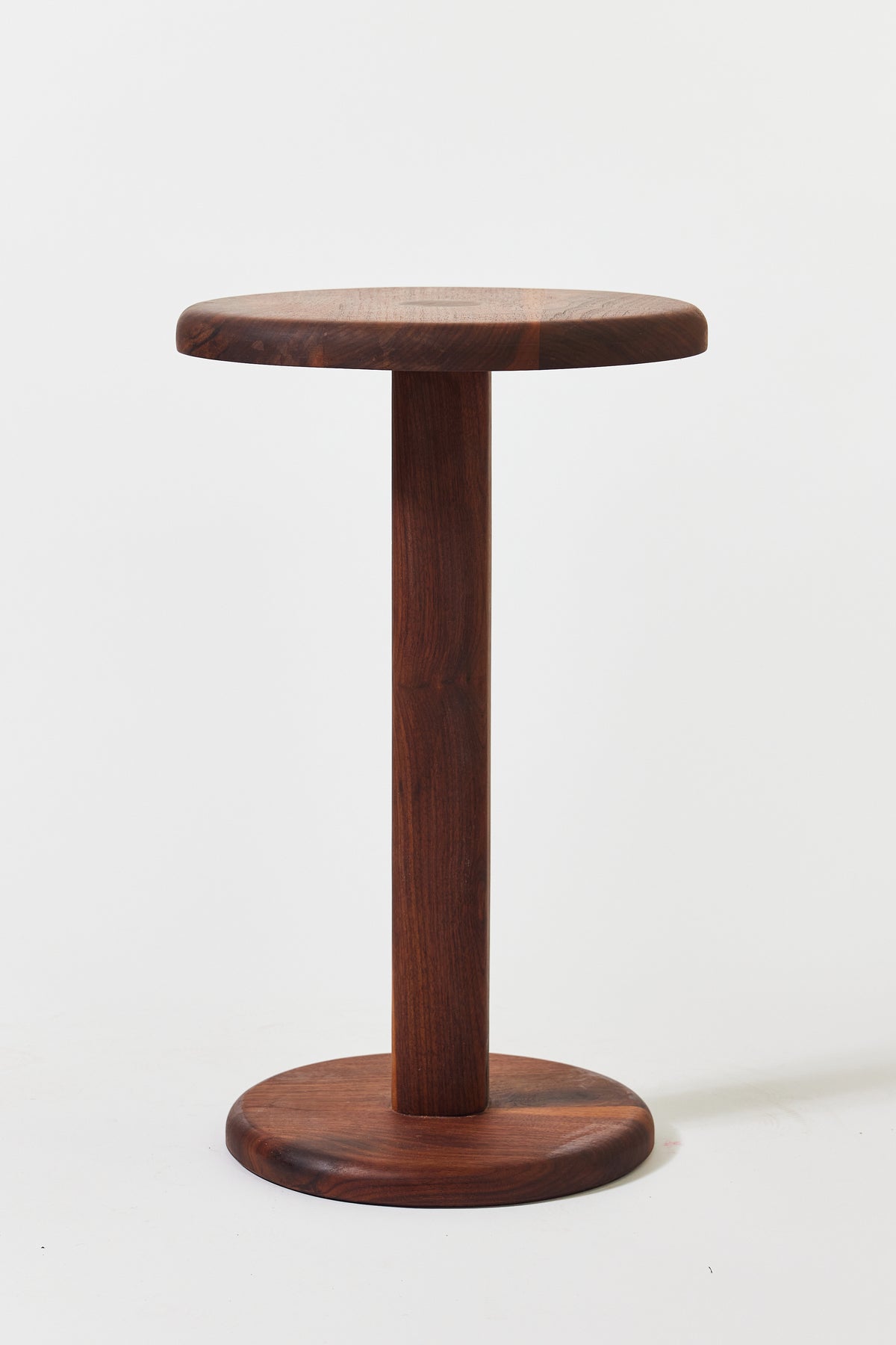 Florian Side Table with large top in solid walnut. Handmade round wooden pedestal side table by Phillip's Daughter