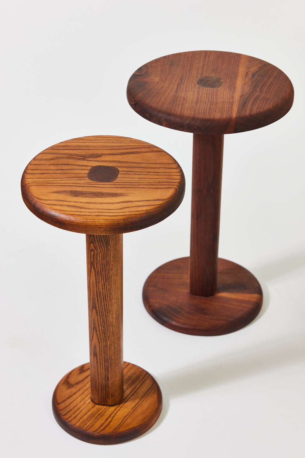 Florian Table with small top in Caramel Ash, detail view 5. Handmade round wooden pedestal side table by Phillip's Daughter