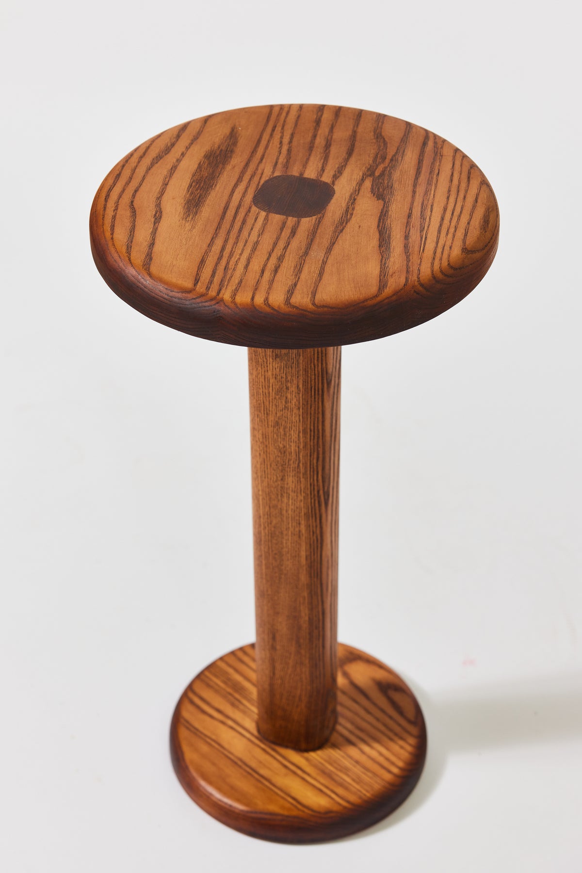 Florian Table with small top in Caramel Ash, alternate view. Handmade round wooden pedestal side table by Phillip's Daughter