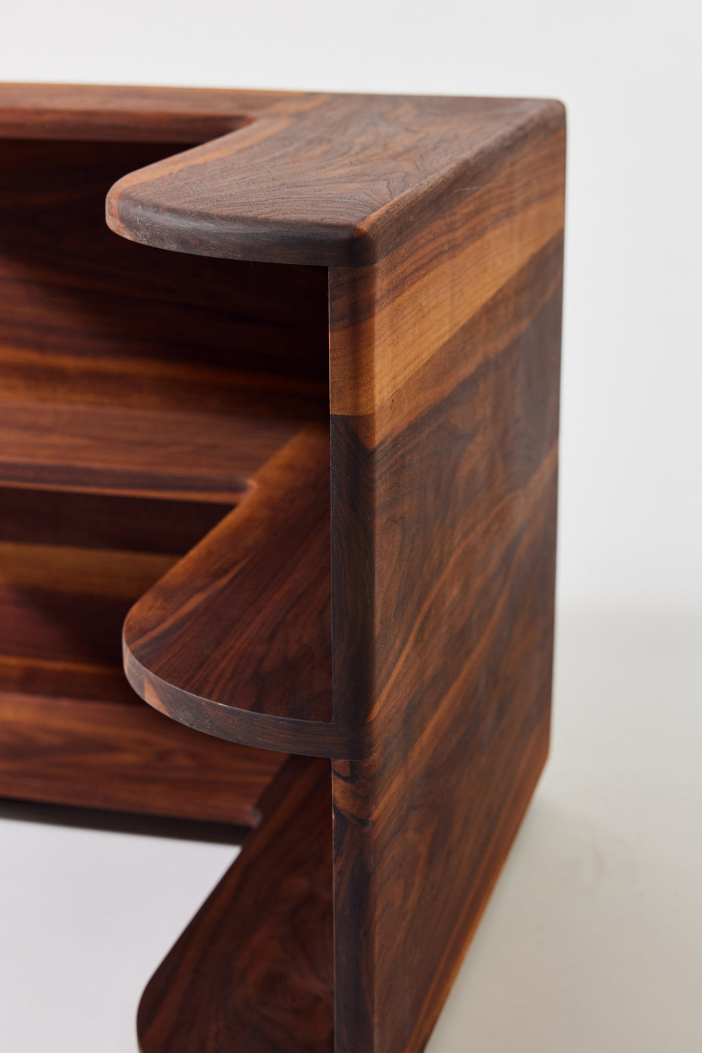 Cornelius Corner Shelf in solid walnut, detail view 4. Handmade wooden corner shelf by Phillip's Daughter