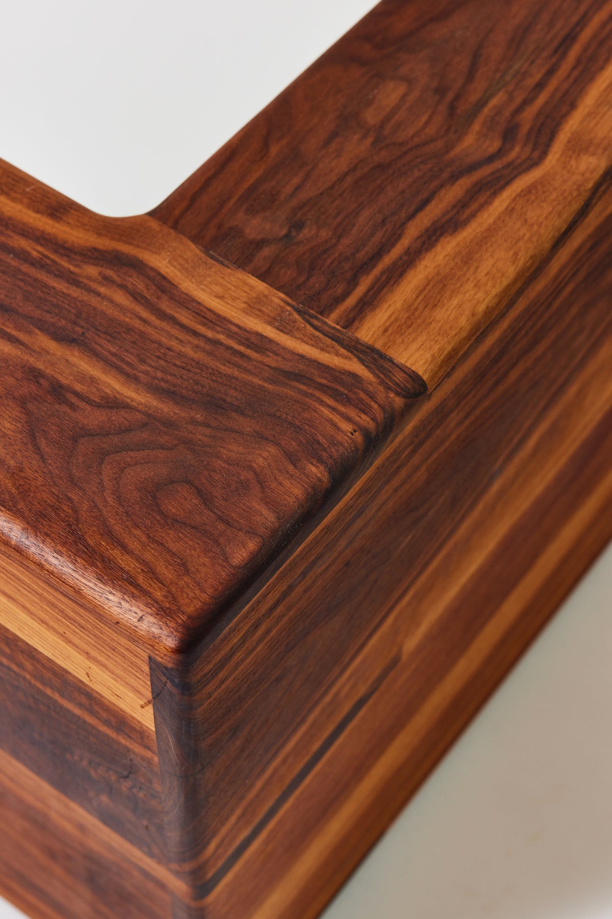 Cornelius Corner Shelf in solid walnut, detail view 6. Handmade wooden corner shelf by Phillip's Daughter