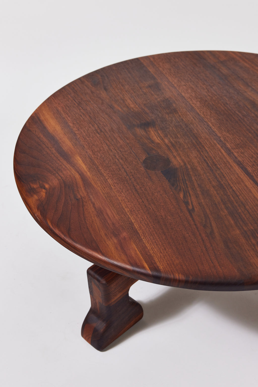 Muffin Man Coffee Table in solid walnut, detail view 2. Handmade solid wood coffee table by Phillip's Daughter