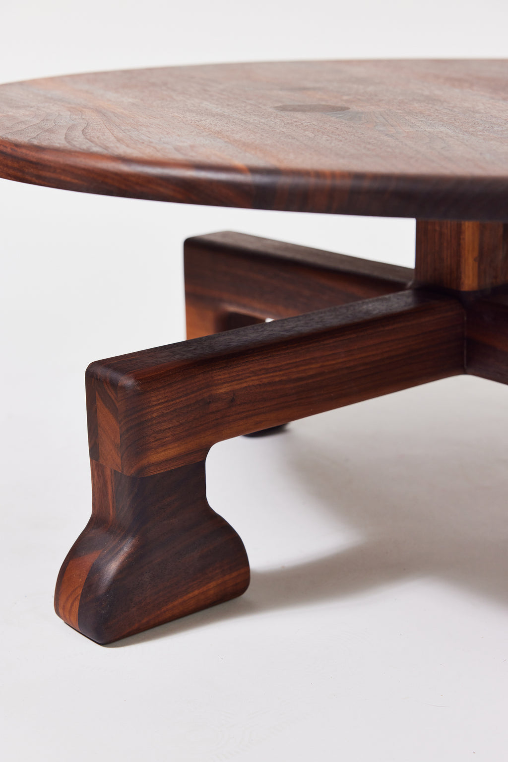 Muffin Man Coffee Table in solid walnut, detail view 4. Handmade solid wood coffee table by Phillip's Daughter