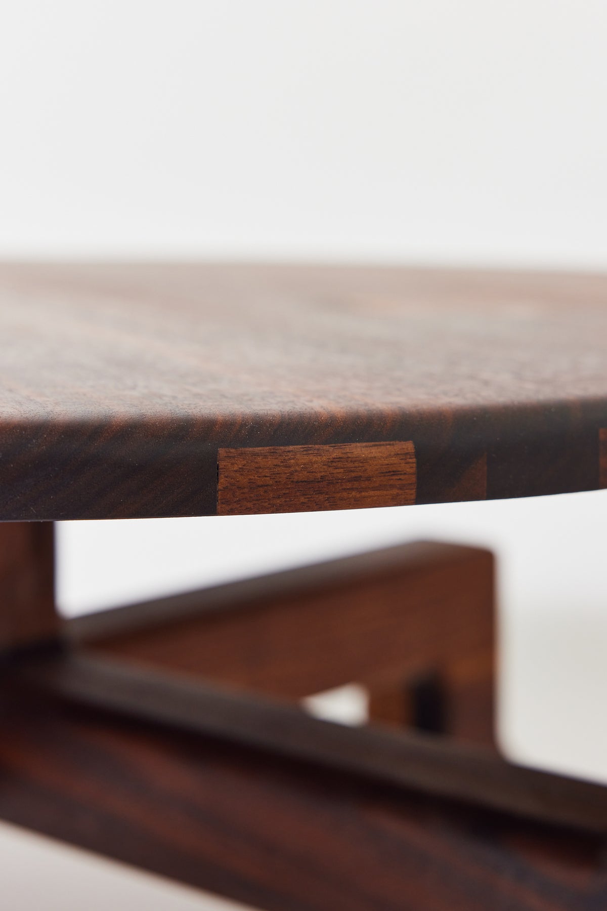 Muffin Man Coffee Table in solid walnut, detail view 5. Handmade solid wood coffee table by Phillip's Daughter