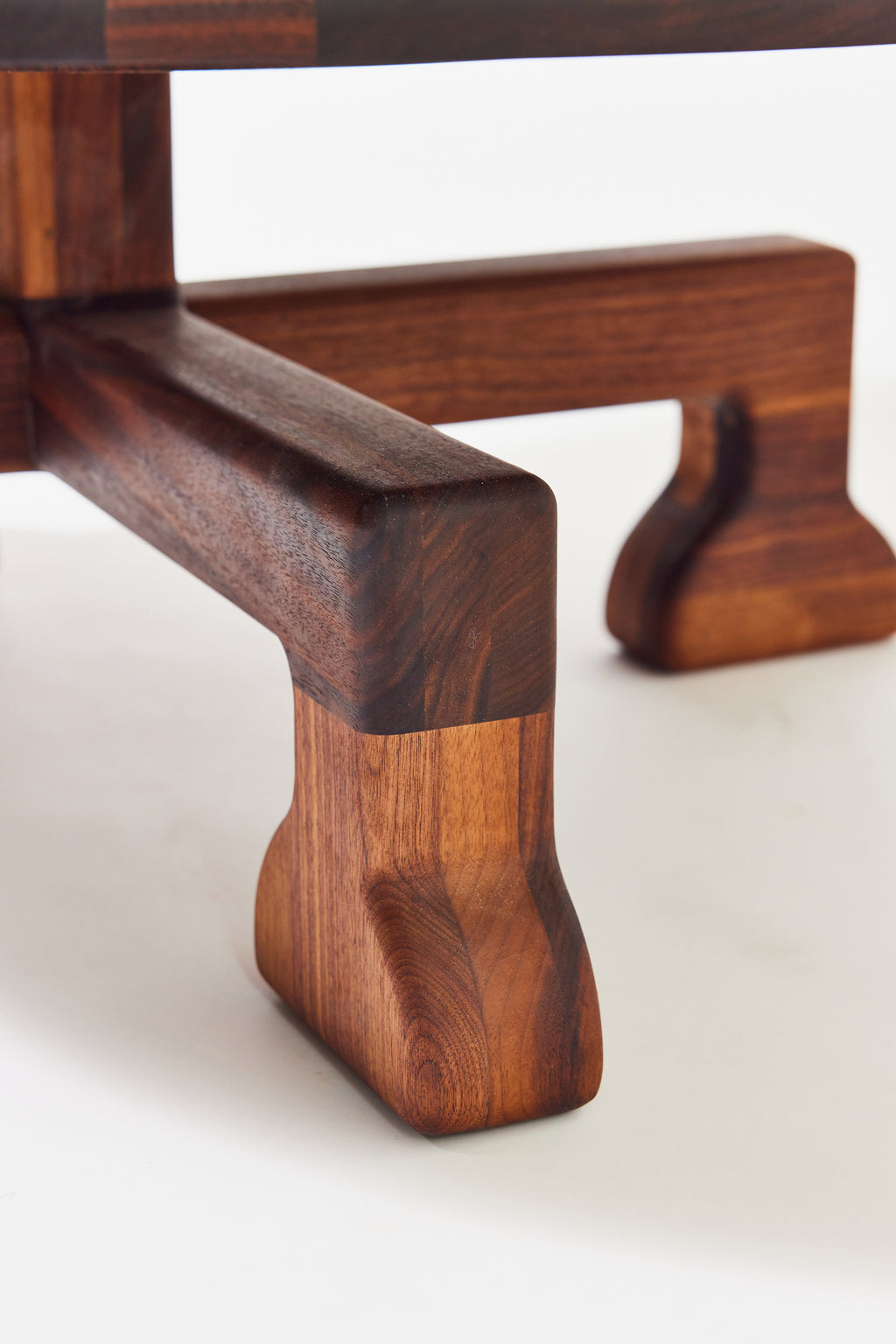 Muffin Man Coffee Table in solid walnut, detail view 6. Handmade solid wood coffee table by Phillip's Daughter