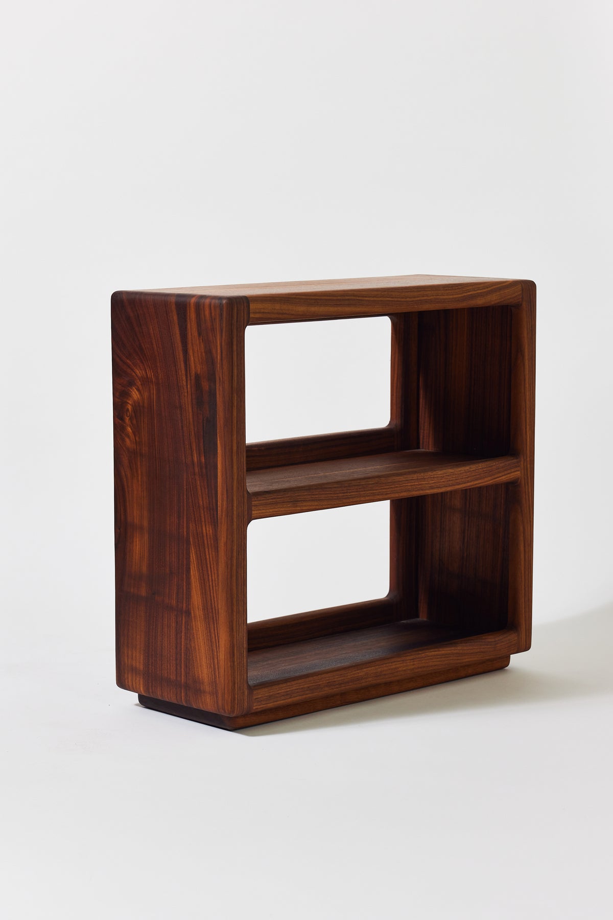 Julius Short Shelf in solid walnut, detail view 4. Handmade low wooden bookshelf by Phillip's Daughter
