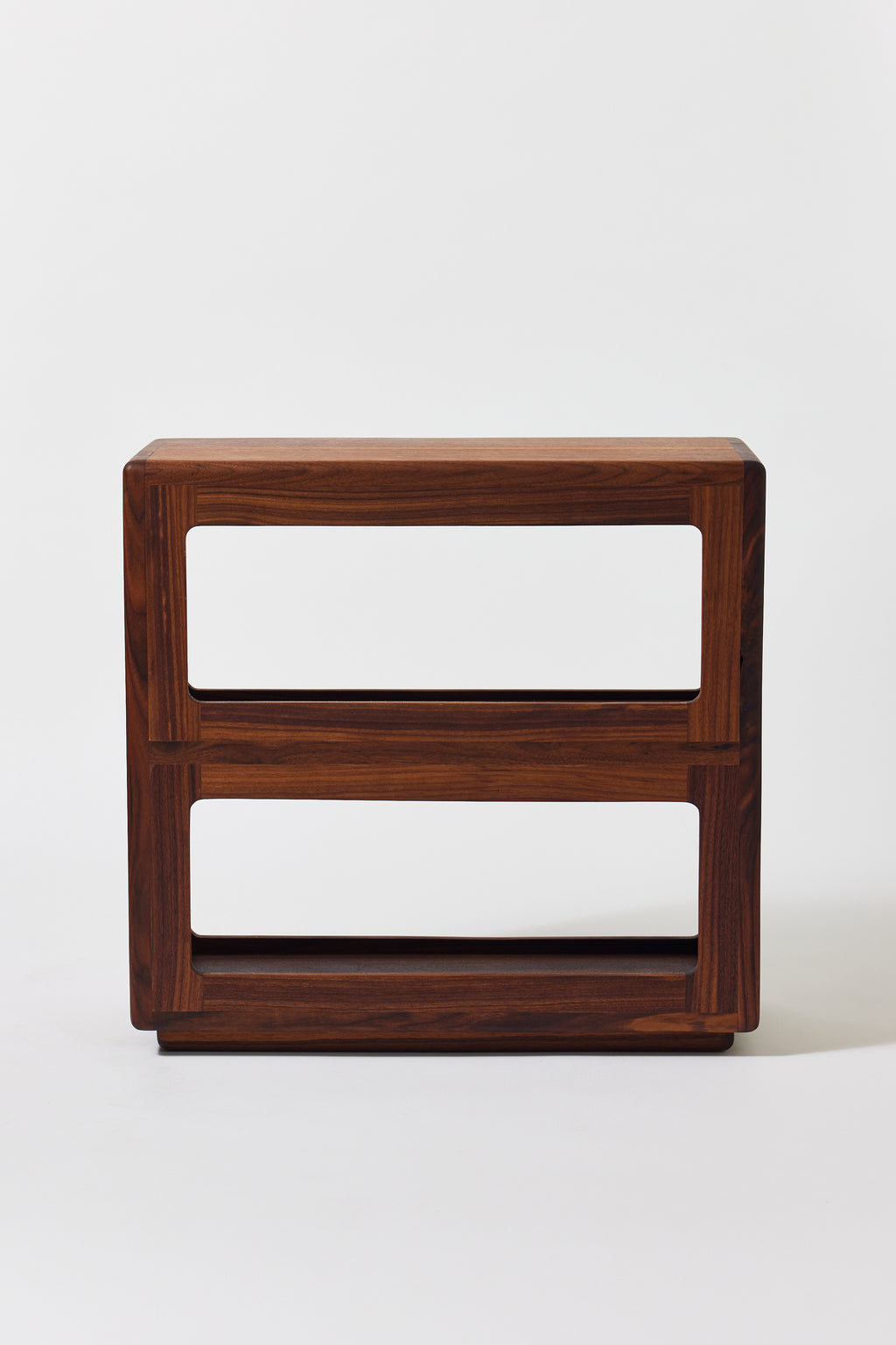Julius Short Shelf in solid walnut, detail view 6. Handmade low wooden bookshelf by Phillip's Daughter