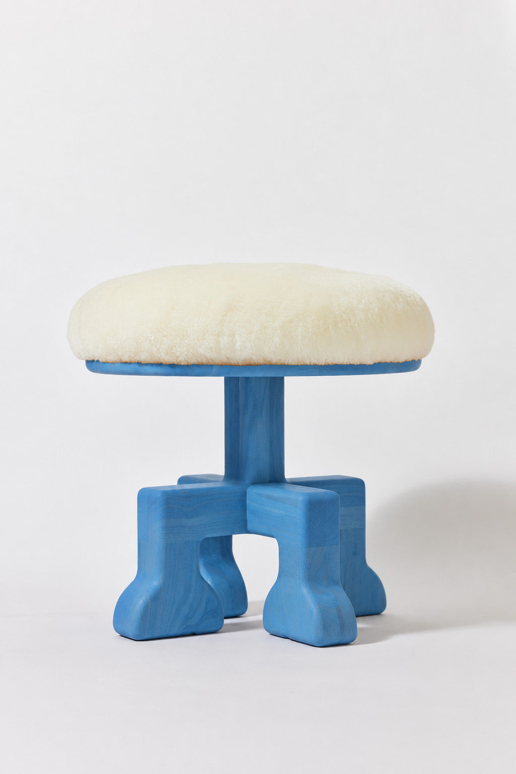 Muffin Man Tall stool in Light Blue Ash with white shearling seat. Handmade tall solid wood stool with shearling seat by Phillip's Daughter