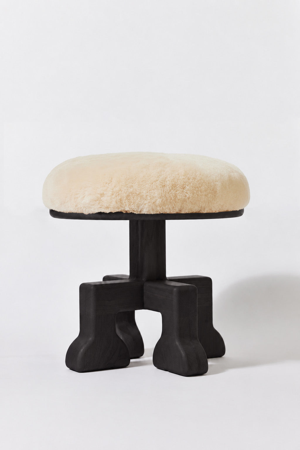 Muffin Man Tall stool in Black Ash with putty shearling seat. Handmade tall solid wood stool with shearling seat by Phillip's Daughter