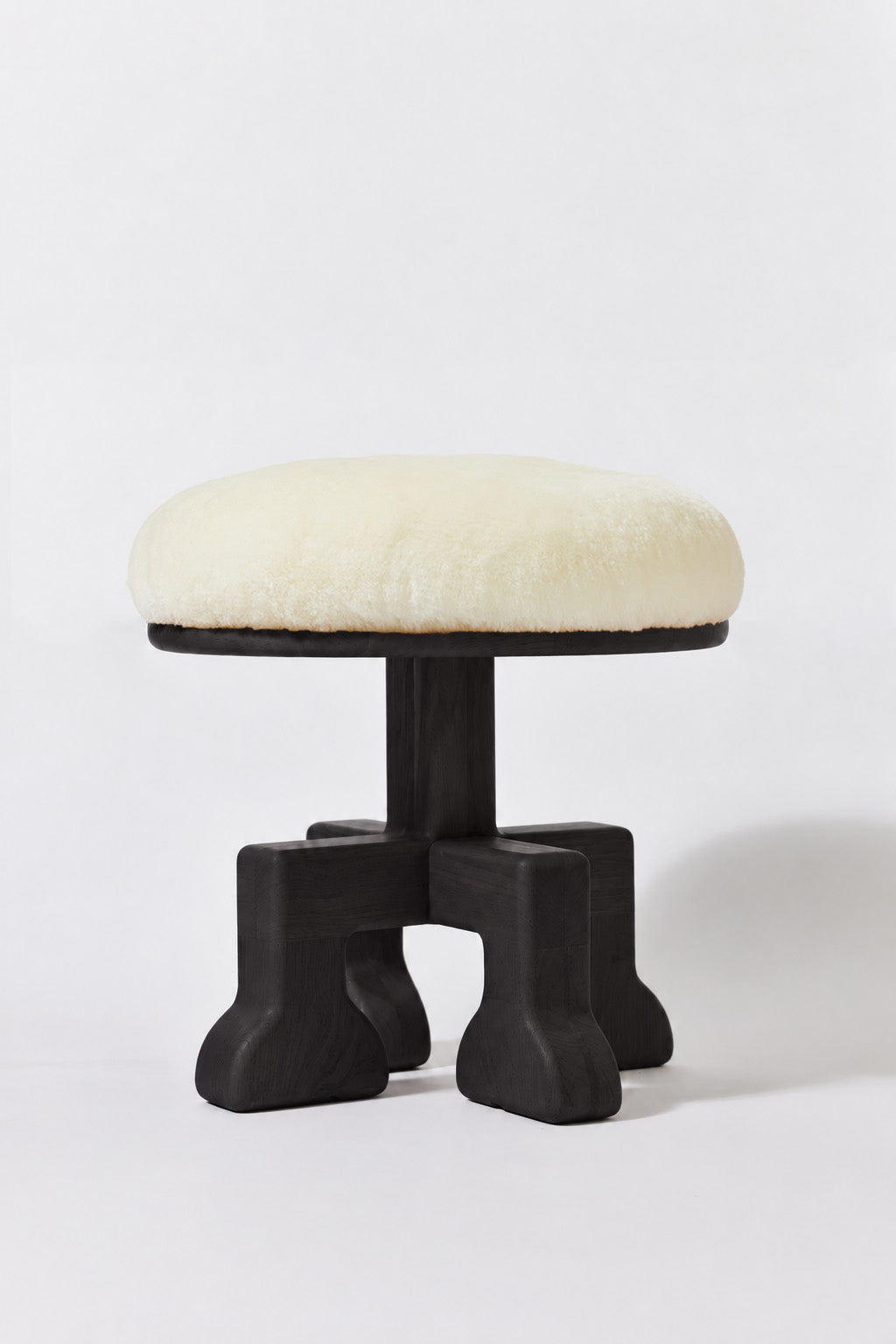 Muffin Man Tall stool in Black Ash with white shearling seat. Handmade tall solid wood stool with shearling seat by Phillip's Daughter