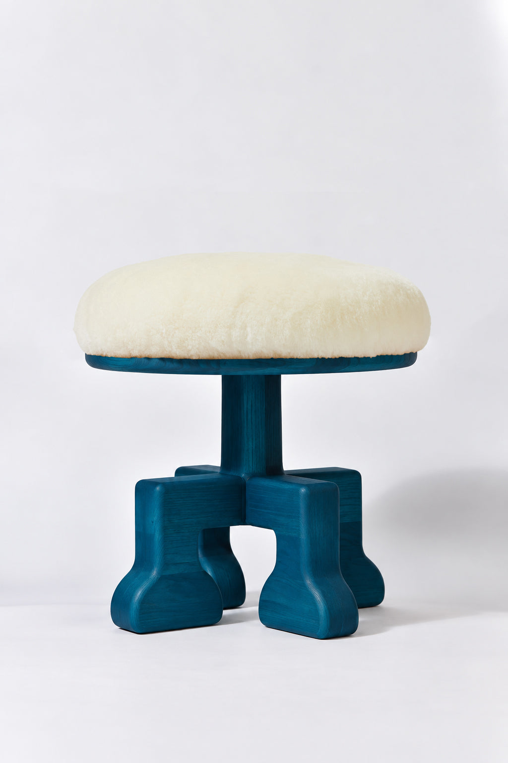 Muffin Man Tall stool in Peacock Blue Ash with white shearling seat. Handmade tall solid wood stool with shearling seat by Phillip's Daughter