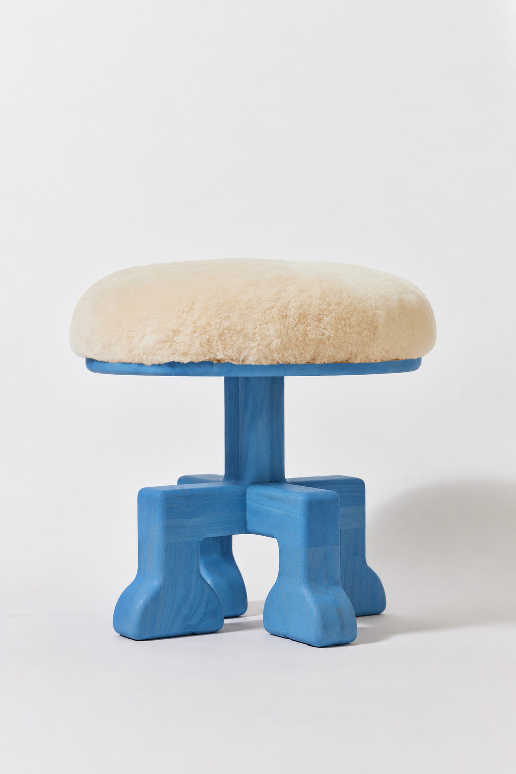Muffin Man Tall stool in Light Blue Ash with putty shearling seat. Handmade tall solid wood stool with shearling seat by Phillip's Daughter
