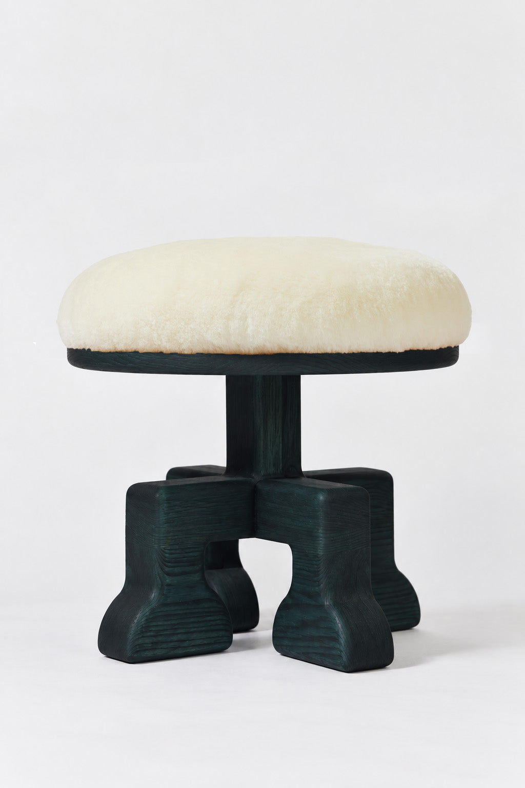 Muffin Man Tall stool in Midnight Green Ash with white shearling seat. Handmade tall solid wood stool with shearling seat by Phillip's Daughter